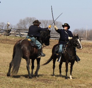  Colonel and Captain demonstrate saber fighting skills